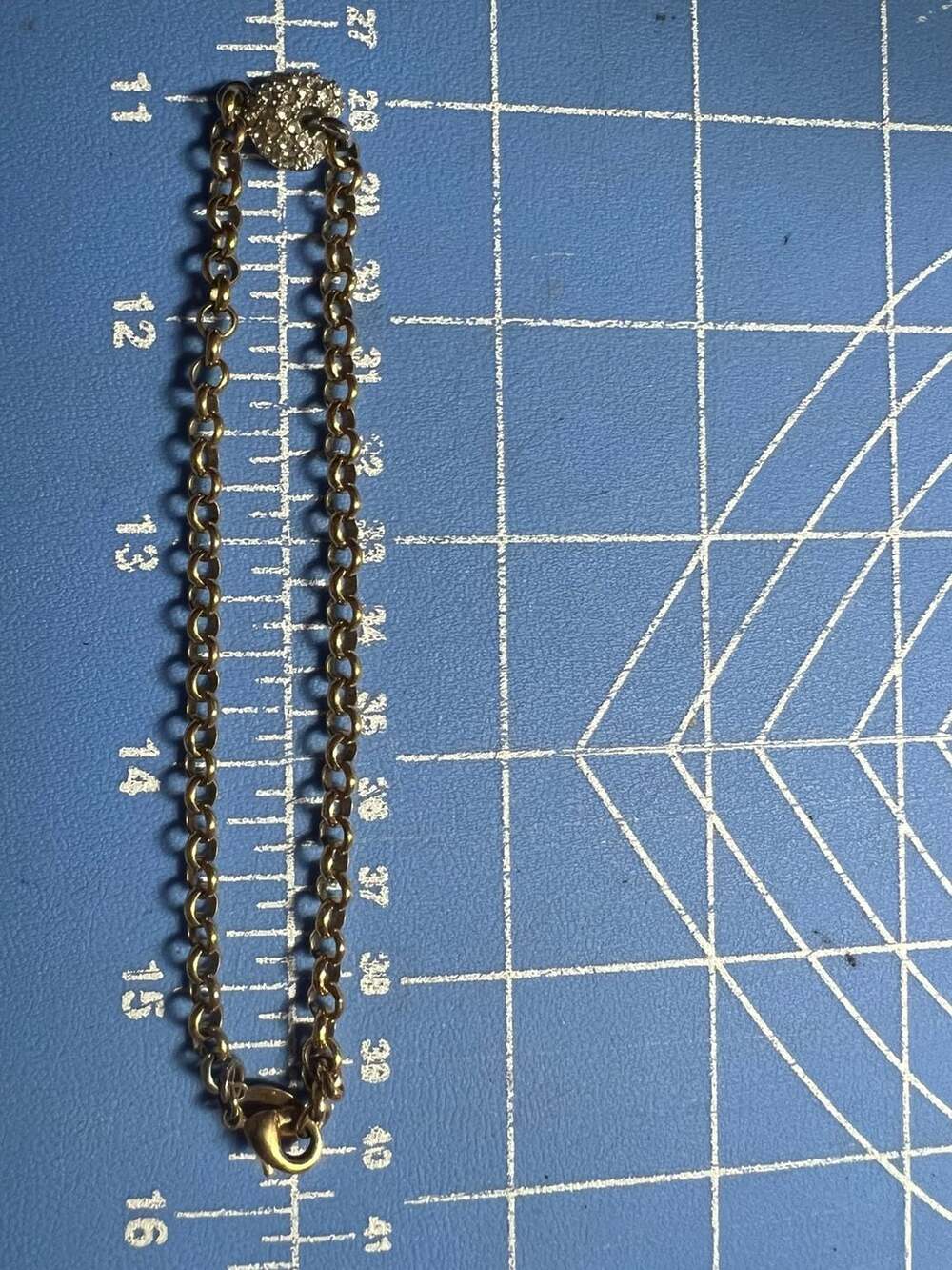 Nolan Miller Gold Tone Chain Link Bracelet with Rhinestone Crystal Heart